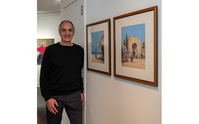 Mark Antebi admires these gouaches with rich, yet muted desert colors depicting Saudi Arabia and the Gulf of Aqaba.
