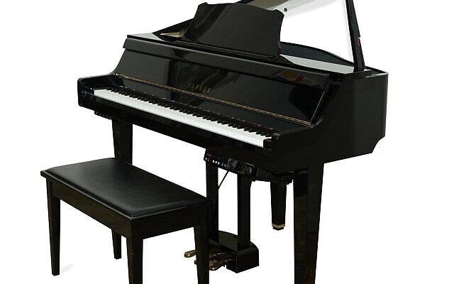 Yamaha player piano with Elton John signed bench ($9,075)