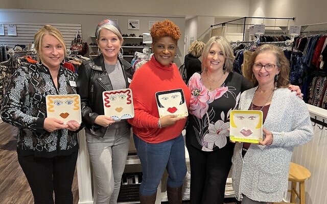 (Second from right) Amy Rees, founder of Personality Plates with the Drake Closet volunteers.