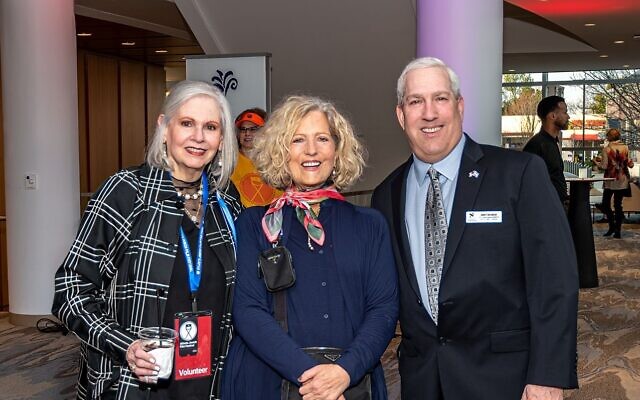 Event co-chair Martha Jo Katz chatted with Sandra Bank of Added Touch Catering, and Sandy Springs City Councilman Andy Bauman.