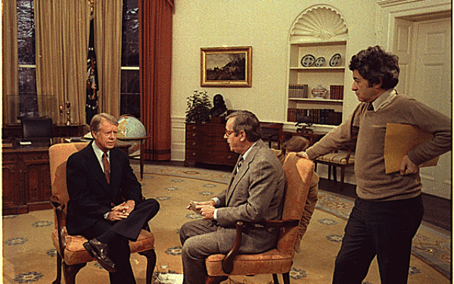 Jimmy Carter prepares for an interview with John Chancellor of NBC News in the Oval Office while Gerald Rafshoon stands by, Jan. 15, 1979 // Photo Courtesy of National Archives