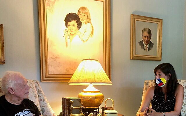 Carter CEO Paige Alexander with former President Jimmy Carter in July 2021 at his home in Plains, Georgia.