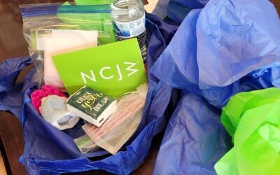 NCJW members prepared more than 90 menstrual bags for homeless women.