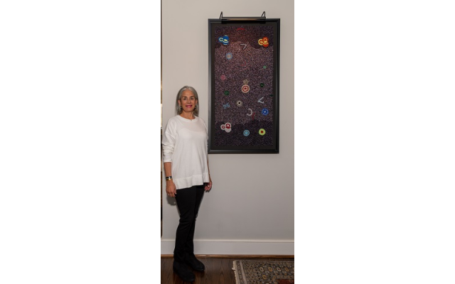 Denny Marcus supports the art of South African women who create beadwork to be self-sufficient. This is one of a series representing the solar system, done by a group of tribal Xhosa women.