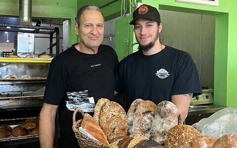 Eli Kikov (left) is a baker and chef at Eli’s Pita, located in Chamblee. Son, Aviam, runs the day-to-day operations.