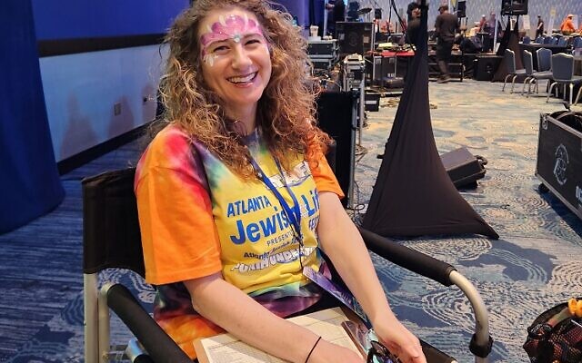 Atlanta Jewish Times account manager Ilyssa Klein took a break from the action to have her face painted.