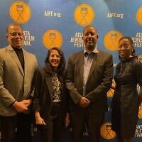 Former Fulton County Board of Commissioners chairperson John Eaves (left) and Victoria Raggs (right) join “Exodus 91” lead Shai Ferdo and his wife, Nofar Moshe Fredo, at the film’s Atlanta premeire at the Atlanta Jewish Film Festival.