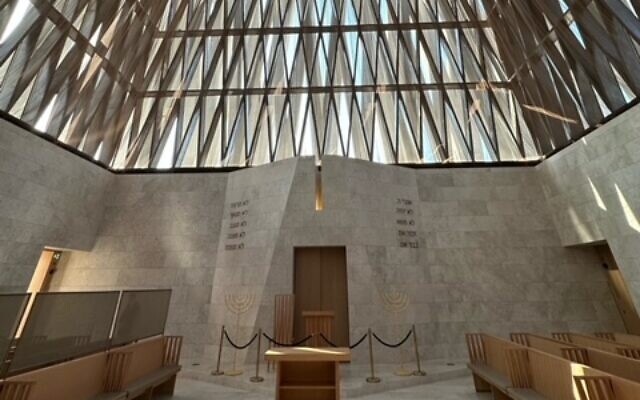 The elegant interior, with its ark for the Torah, has the Ten Commandment incised on its walls.