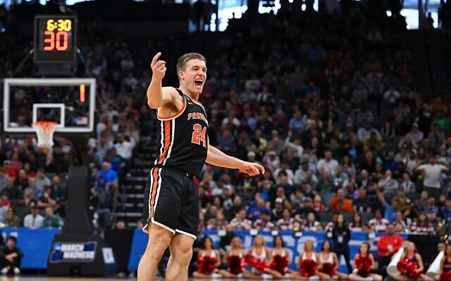 Every year during March Madness, there’s inevitably at least one Cinderella story that captures fans’ attention. This year, it was Blake Peters (No. 24) and the Princeton University Tigers // Photo Credit: Greg Carroccio/Sideline Photography