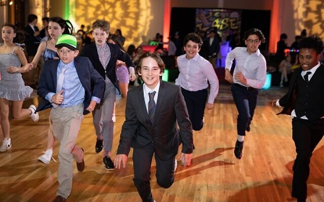 Jesse and his friends dance to the beat.