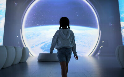 The Illuminarium’s newest exhibit is “SPACE: A Journey to the Moon & Beyond.”