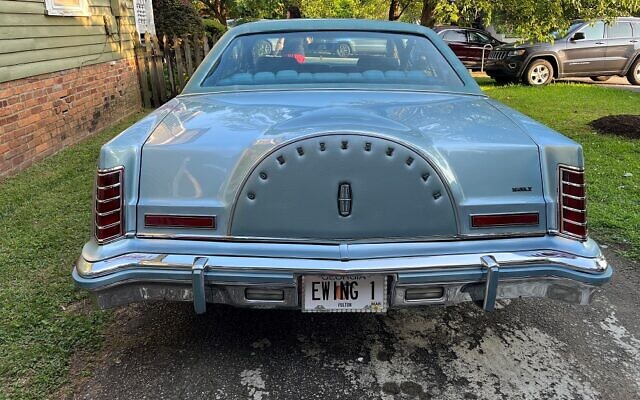 Ryan’s blue Lincoln with the Ewing license plate channels his love for the TV show, “Dallas.”  
