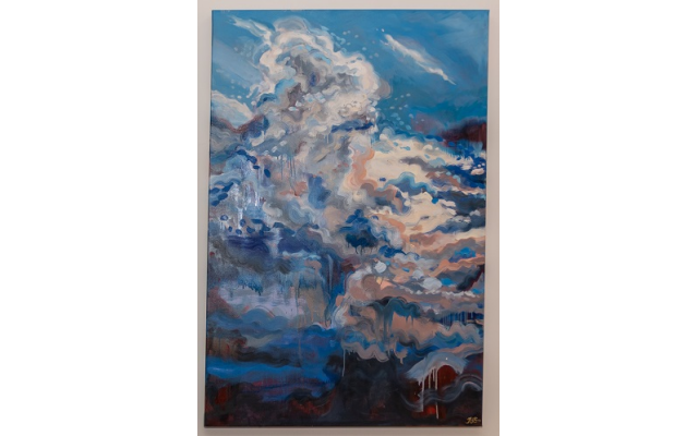 This painting, Rachel Grant’s “Cloud Metaphor,” swirls in the couple’s living room. 