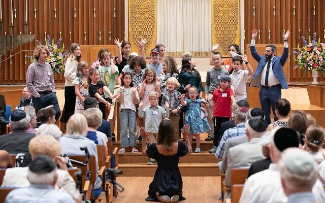 The Kesher children provide a rousing chorus