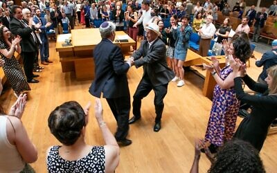 Steve Grossman and Rabbi Rosenthal dance with joy // Photo Courtesy of Chris Savas