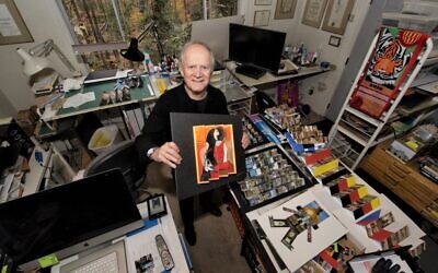 Paul Muldawer, shown in his lower-level workshop, stores thousands of photos for future art projects to share with his TikTok viewers.