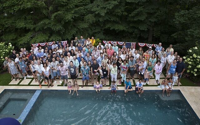 A Saturday night pool party in Buckhead was a highlight of the family reunion // Photo Credit: Greg Gimpelevich