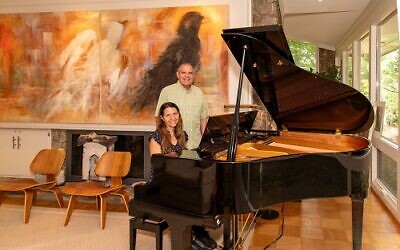 Meryl and Richard Franco reminiscence by playing piano adjacent to one of Phyllis Franco’s magnificent bird diptychs // Photos by Howard Mendel