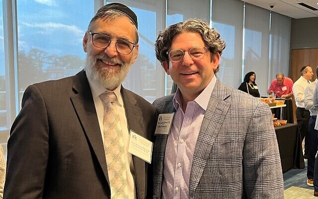 Congregation Ariel Rabbi Binyomin Friedman chatted with Hillel Director Larry Sernovitz. 