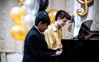 A piano duet, “Flight of the Bumblebee,” by N. Rimsky-Korsakov, performed by Vedant, an advanced student, with his teacher, Jo, at the ESM 30th Celebration Concert. With this virtuoso piece, Vedant, who is from an Indian family, is developing his technique for a challenging piano competition in the spring.