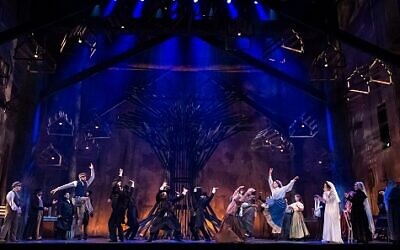 Black is a powerful production element in the stage setting for “Fiddler On The Roof.”