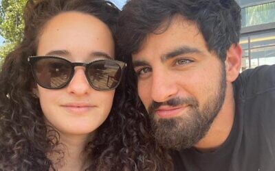Gil Tohar, who grew up in Atlanta, but lives near Mount Herzl national cemetery in Jerusalem, said he kept hearing funeral services chanted by an army cantor through his window. Here, Tohar is pictured with his wife, Meital.