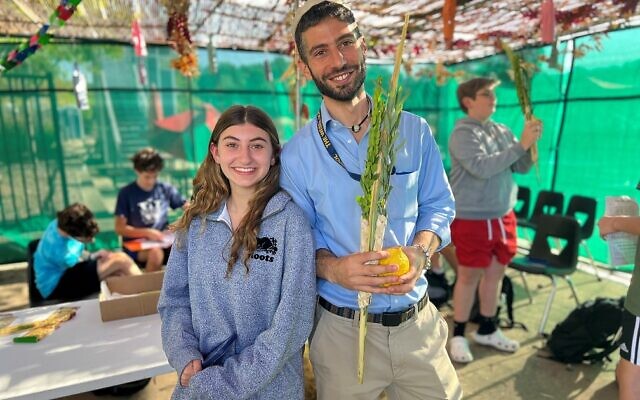 Weber’s Dean of Jewish Studies, Rabbi Adam Mayer, taught his students how to bless and shake the Lulav and Etrog in Weber’s sukkah.