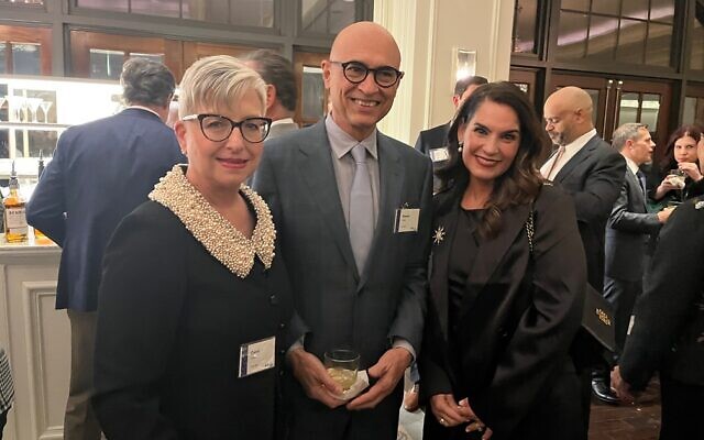UPS CEO Carol Tome, previous award recipient, praised the selection of Bill Rogers for this year; also pictured are Ramon Tome and Cathy Scott.