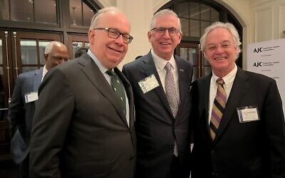 Award honoree Bill Rogers (center) posed with Chris Sawyer (left) and the Rev. Sam Candler (right).