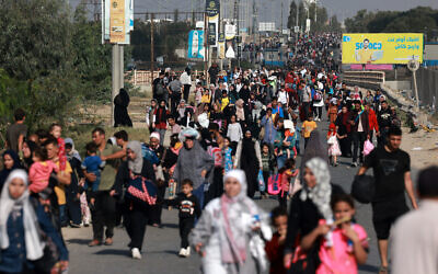 Palestinians fleeing Gaza City toward the south walk on a road on Nov. 8, 2023 // Photo Credit: MOHAMMED ABED/AFP/Times of Israel