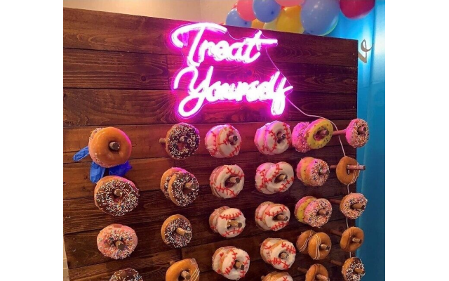 Goldschein is known for her outrageous rack displays like this “Treat Yourself” festive donut racks // Photo Credit: Rachel Goldschein