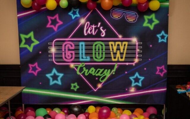 “Let’s Glow Crazy” sets the stage for a fun event // Photo Credit: Scensations/Patti Covert 
