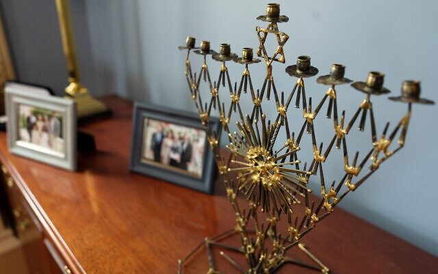 A menorah sits on the mantle of the Second Gentleman’s office, Wednesday, Dec. 6, 2023, in the Indian Treaty Room of the Eisenhower Executive Office Building at the White House // Official White House Photo by Oliver Contreras/JTA
