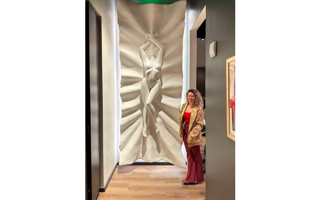 Daughter, Kayla Alexander, who trained at the Chicago Institute of Art, fashioned this huge, 300-pound plaster sculpture for the Westside location. The back lighting enhances its dramatic effect. Kayla’s piece is 10’ x 4’.  