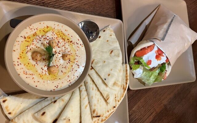 Always reliable: house made hummus alongside a traditional falafel wrap at the Great Greek.