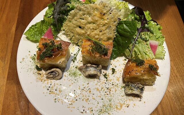 The Alden Caesar salad with rolled white boquerones and huauzontle was a table favorite.