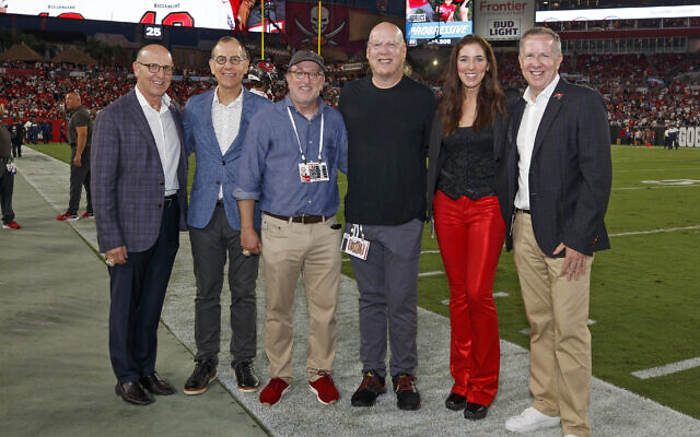 For nearly 30 years, the Tampa Bay Buccaneers have been under the stewardship of the Glazer family (pictured, from left): Joel Glazer, Kevin Glazer, Edward Glazer, Avram Glazer, Darcie Glazer Kassewitz and Bryan Glazer). This year, the team defied all expectations in reaching the NFC Divisional Playoffs // Photo Courtesy of Tampa Bay Buccaneers