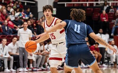 Stanford sophomore guard Benny Gealer (white jersey) is one of the most dynamic Jewish college basketball players in the country this year and hopes to help guide the Cardinal back to March Madness // Photo Credit: Scott Gould/ISI Photos
