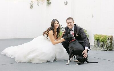 Rescue dog, Maggie, was a wedding VIP. Caroline said that Max’s care for the pup is endearing.