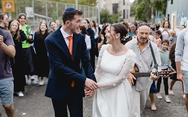 Aaron and Tamar had a wedding procession in the streets of Baka, cheered on by neighbors and onlookers.