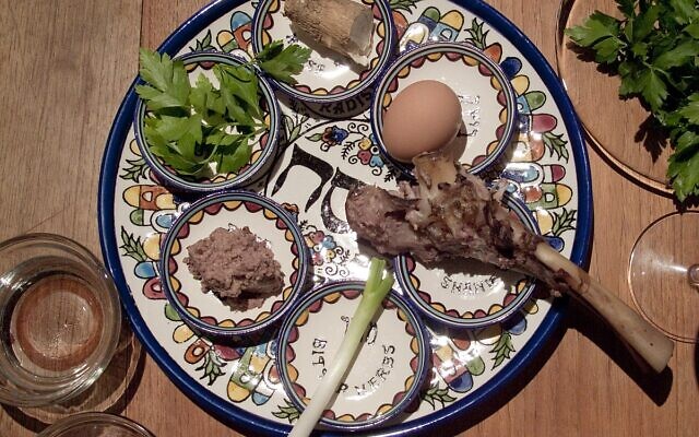The Passover seder plate contains karpas, charoset, maror, hazeret, zeroa, and beitzah.