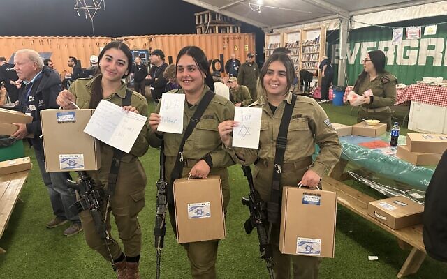 Presenting gifts to IDF soldiers at barbeque.