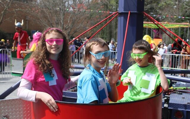 A trio of children are decked out in colorful shades // Photo Credit Tziporah Wayne, Happy Heart Photography