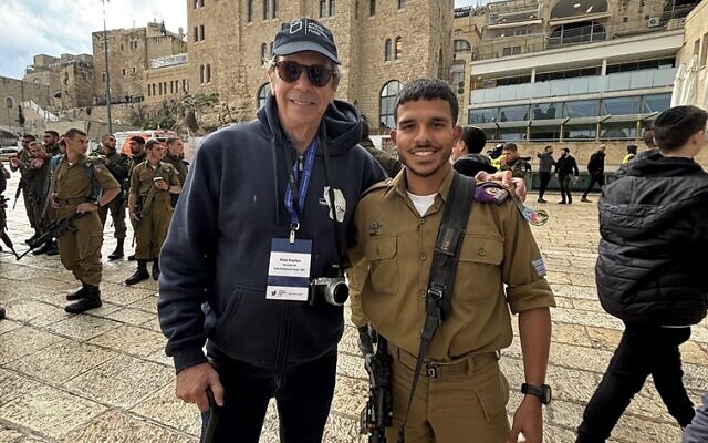 Alan pictured with an IDF soldier while visiting the Western Wall.