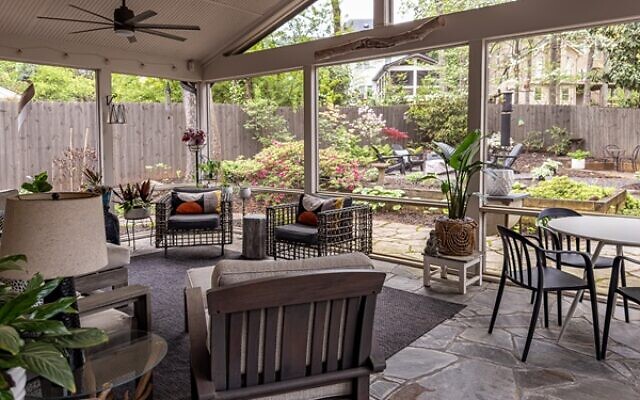 The enclosed porch (24 x 15 ft) is among Miller’s favorite entertainment spaces.