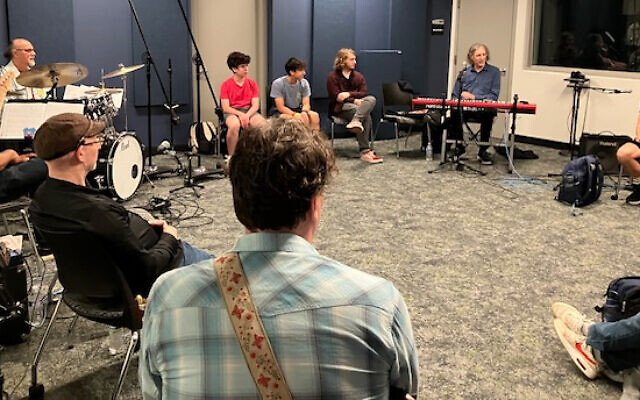 The Howard Levy 4 spent an hour discussing the rigor of a professional musician with music students at the Weber School.