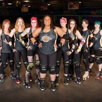 Peach State Roller Derby will play a home bout on Aug. 11 at Sparkles of Kennesaw. Allison Barchitchat is pictured second from right.