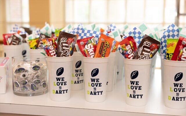 Take home favors included customized jibbitz and stadium cups labeled, “We love to Darty” // All Photos by SRD Photo