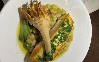 Alaskan halibut and butter beans were topped with a crispy artichoke ($36).