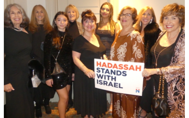 Hadassah Greater Atlanta’s multi-generational fashion models recognize that our love of Israel is woven into the fabric of Hadassah: (from left) Phyllis M. Cohen, Connie Mintz, Abby Shartilow, Judy Bracker, Rosalie Agrow, Nailah Mazer, Randi Mazer, Mindy Cohen, and Nancy Schwartz.